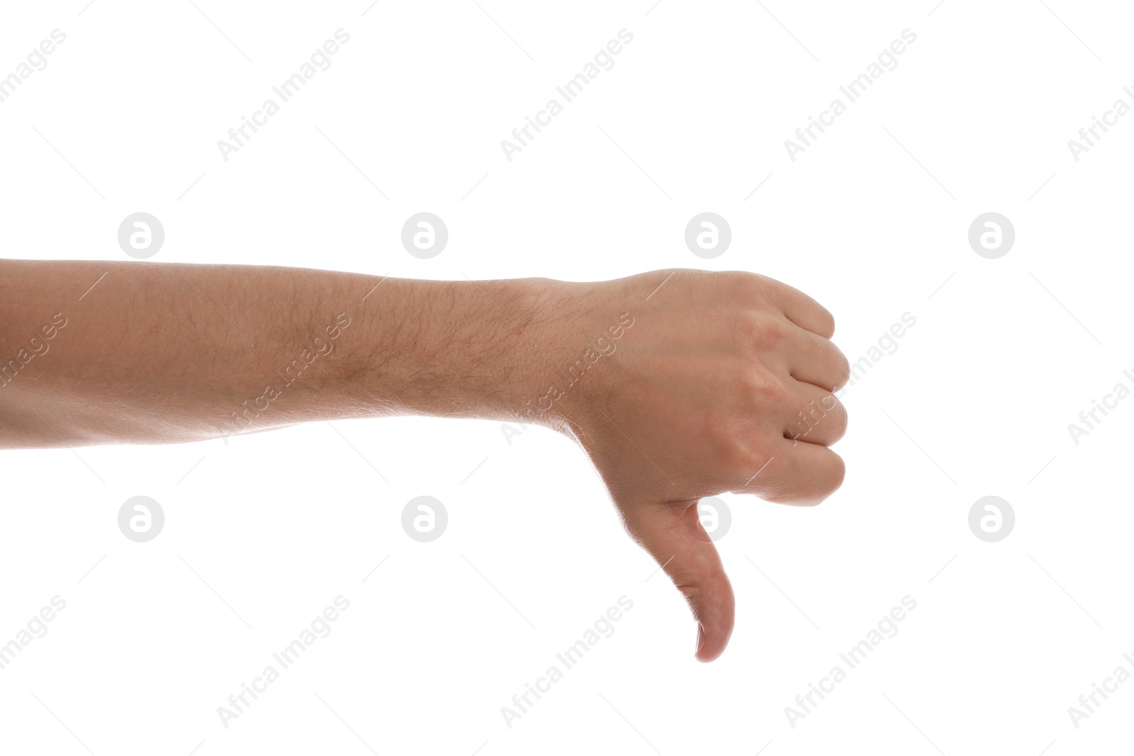 Photo of Man showing thumb down gesture against white background, closeup of hand