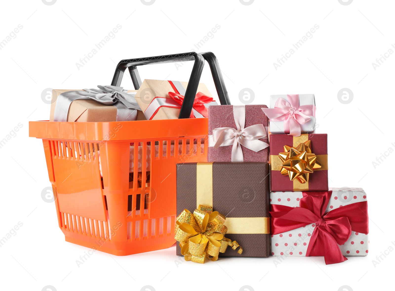 Photo of Orange shopping basket with different gifts on white background