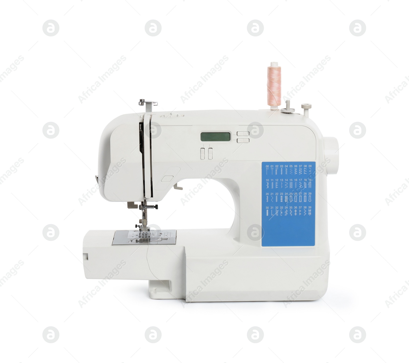 Photo of Modern sewing machine with pink thread isolated on white