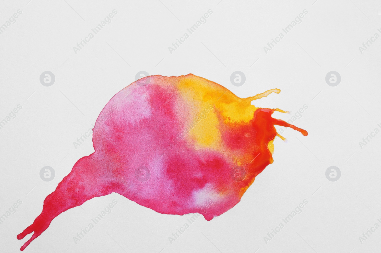 Photo of Colorful ink blot on white canvas, top view