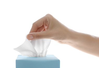 Photo of Woman taking paper tissue from box on white background, closeup