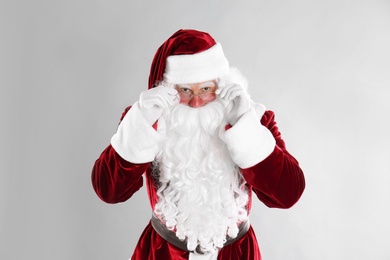 Portrait of Santa Claus on light grey background