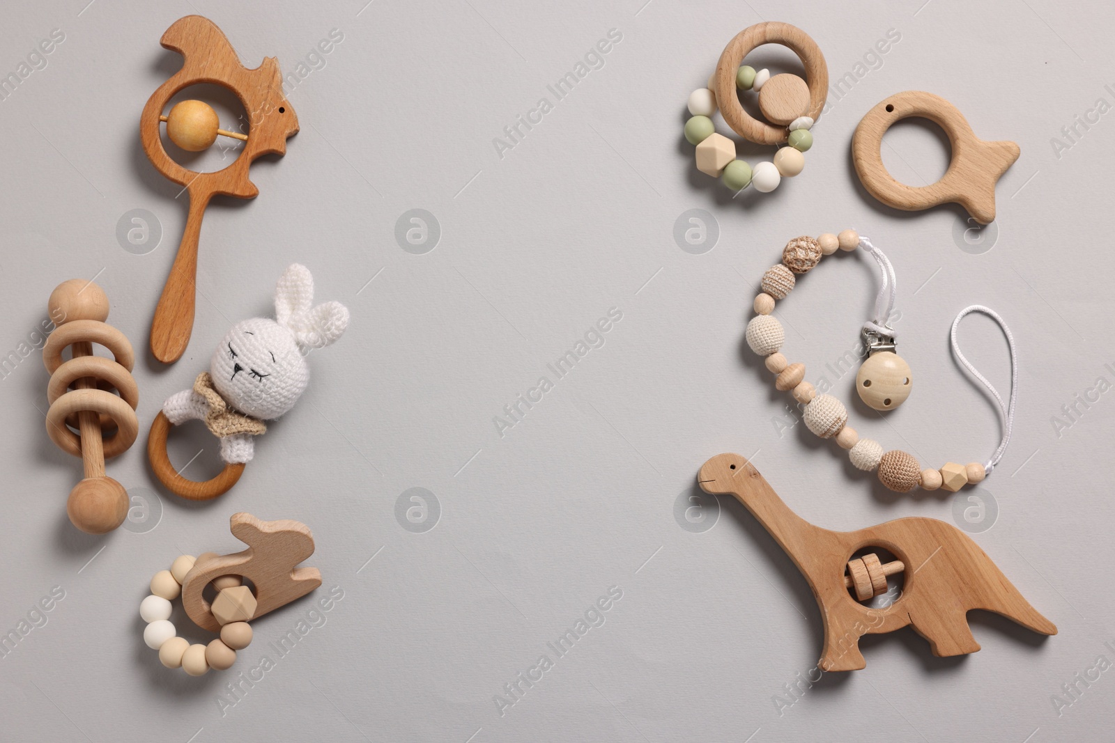 Photo of Different baby accessories on grey background, flat lay. Space for text