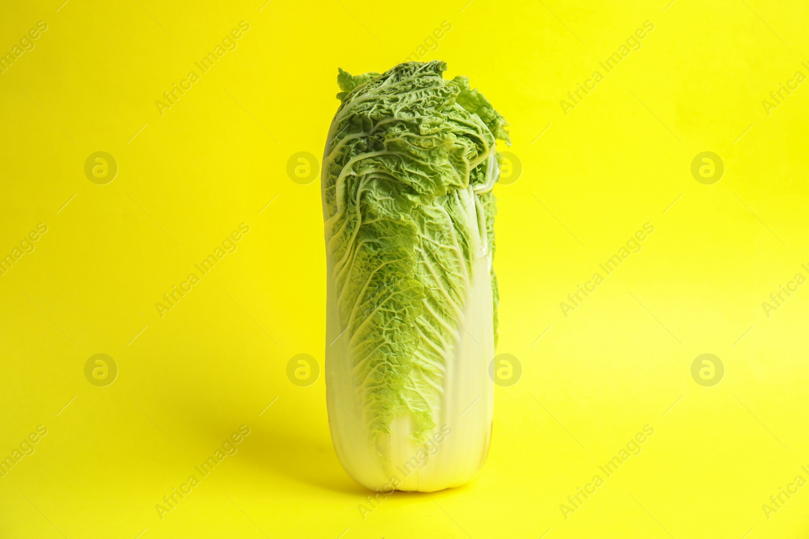 Photo of Fresh ripe cabbage on color background