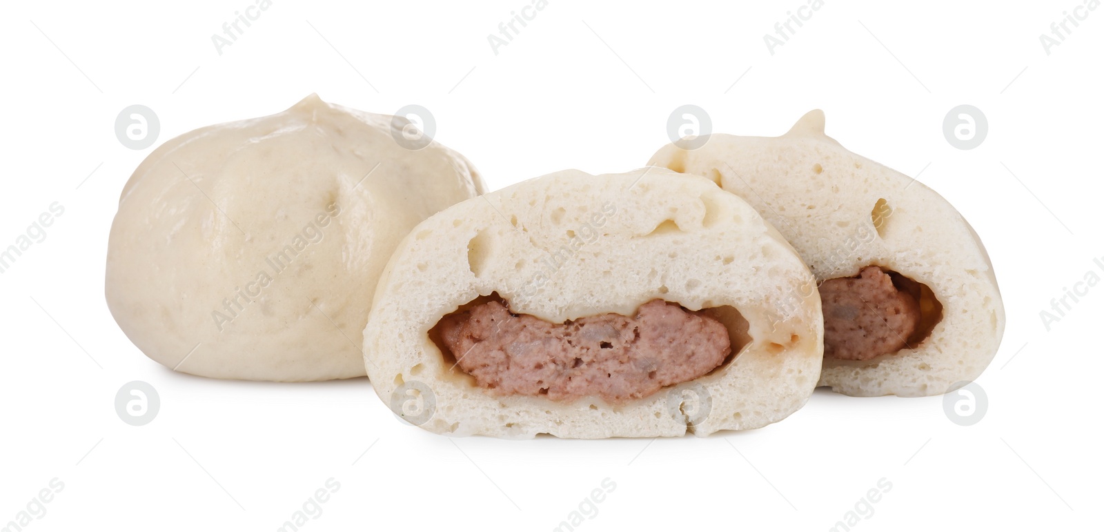 Photo of Delicious bao buns (baozi) isolated on white