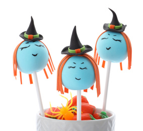 Photo of Delicious witch cake pops on white background. Halloween season