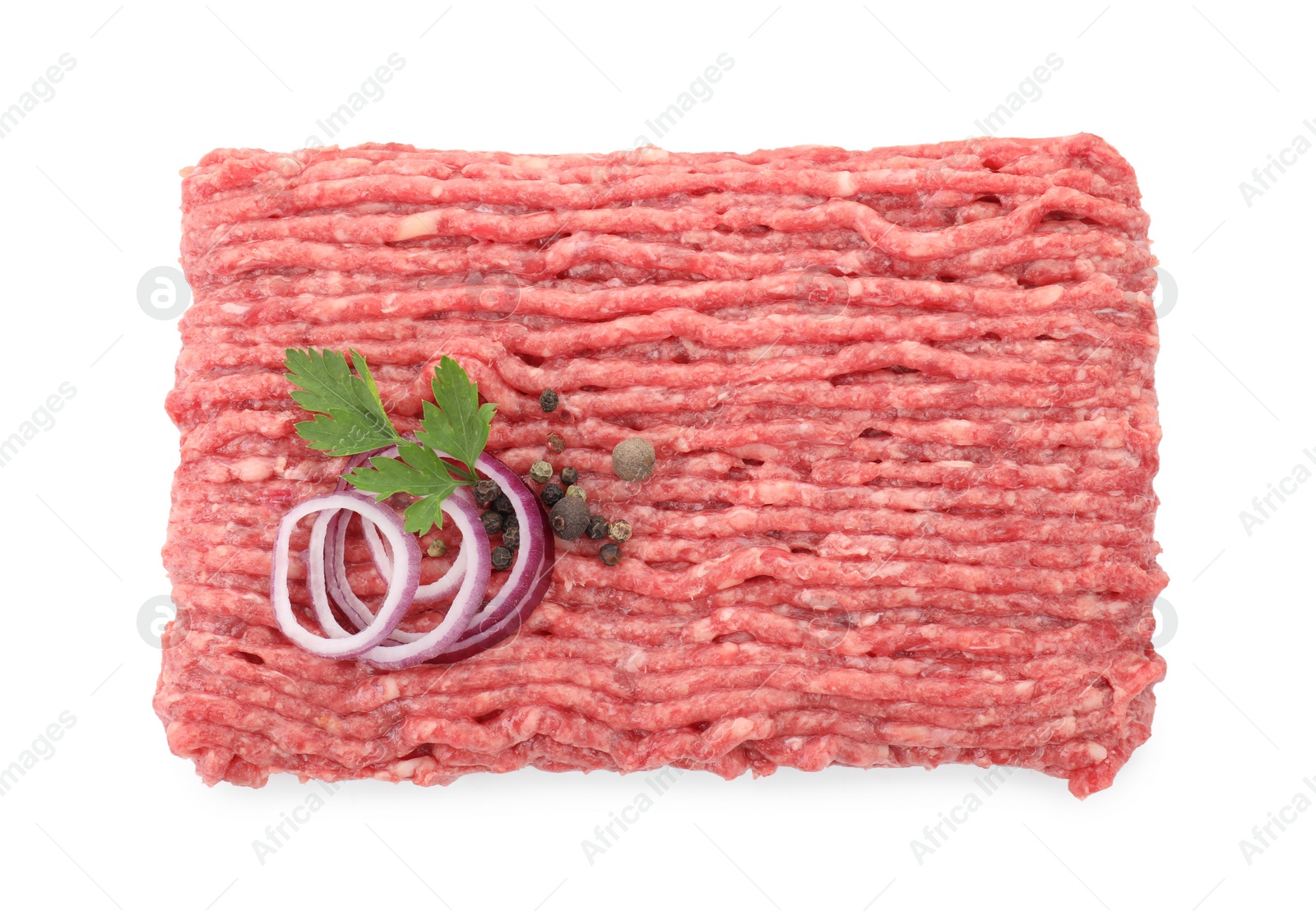 Photo of Raw ground meat, onion, peppercorns and parsley isolated on white, top view