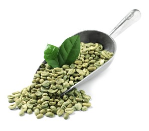 Photo of Pile of green coffee beans, leaves and scoop on white background