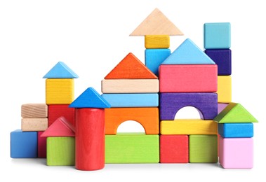 Photo of Toy castle made of bright building blocks on white background