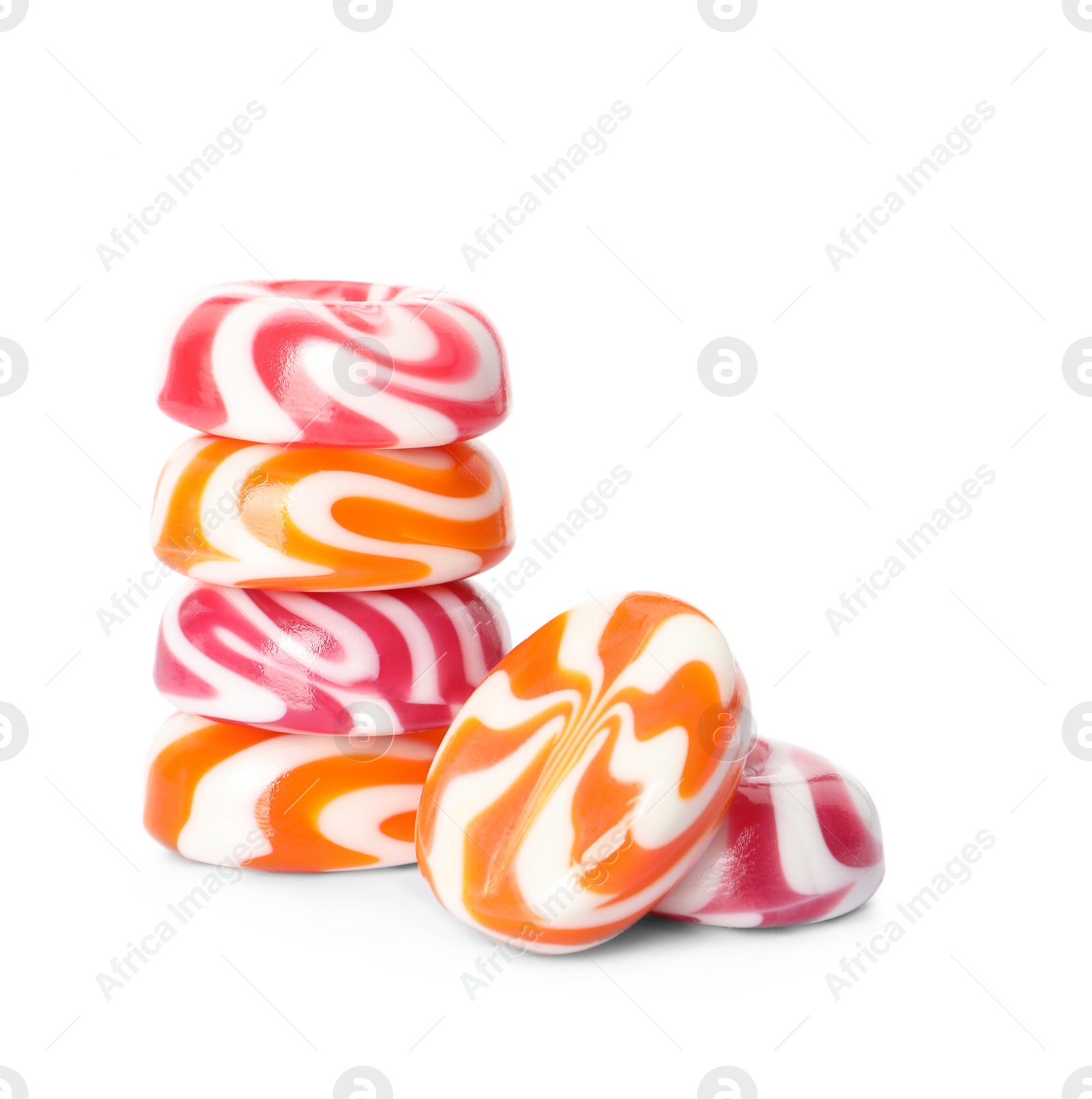 Photo of Many delicious colorful candies on white background