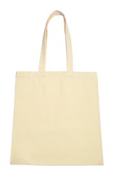 Photo of Blank beige textile bag on white background, top view. Mockup for design