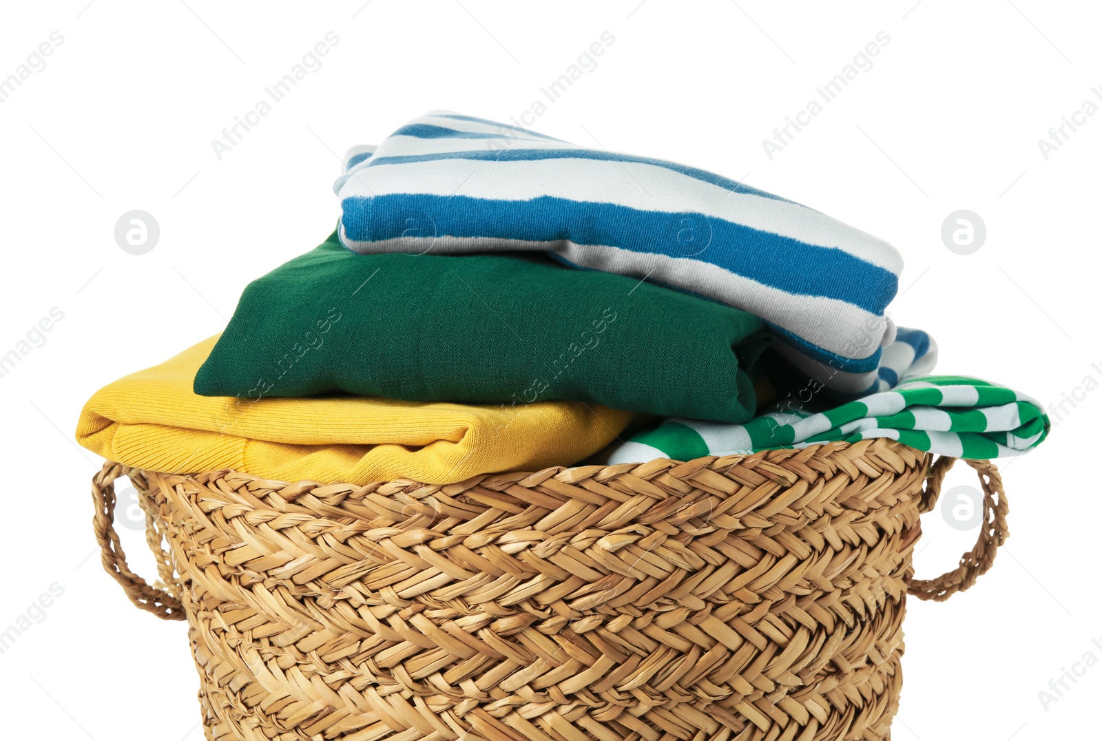 Photo of Wicker laundry basket with clean clothes isolated on white