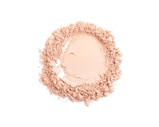 Photo of Sample of crushed face powder on white background, top view