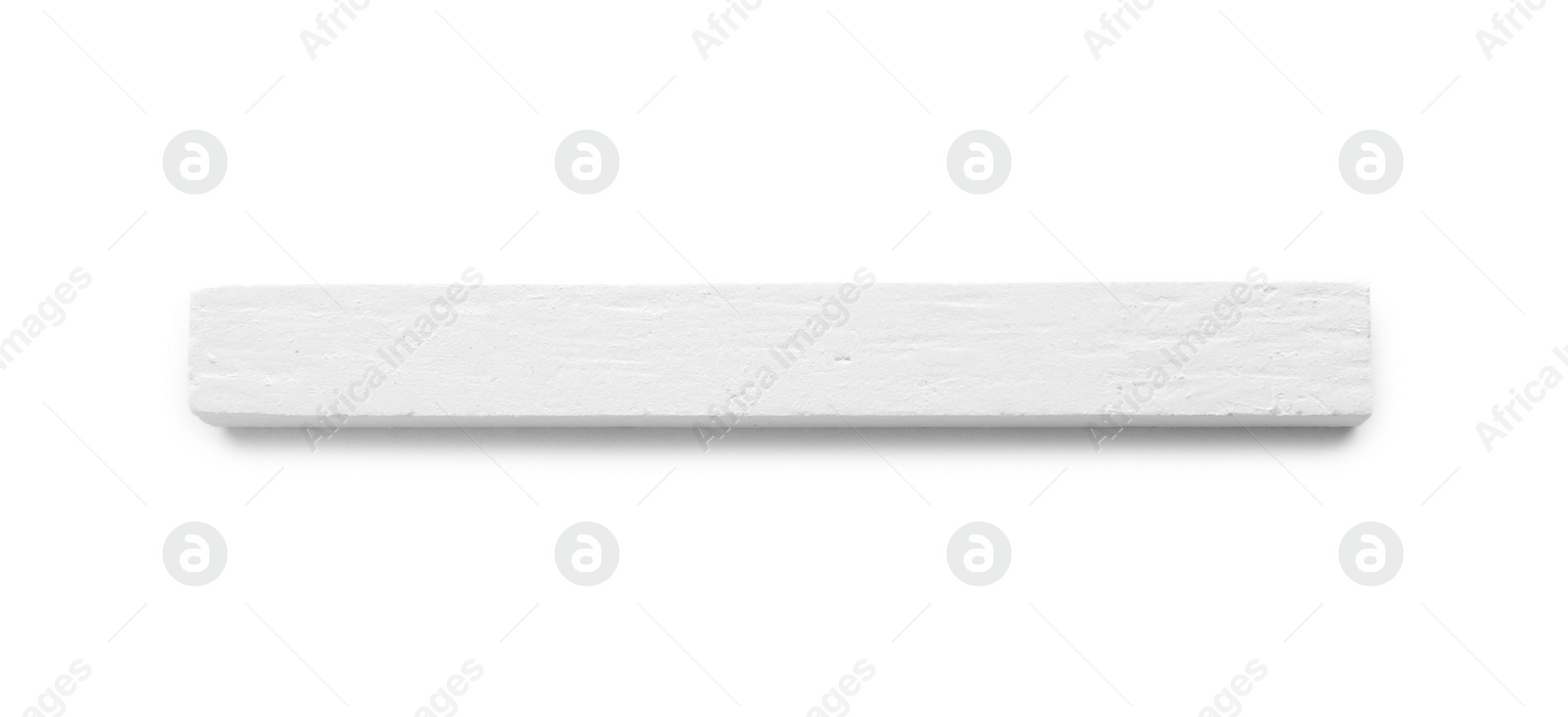 Photo of Piece of chalk on white background