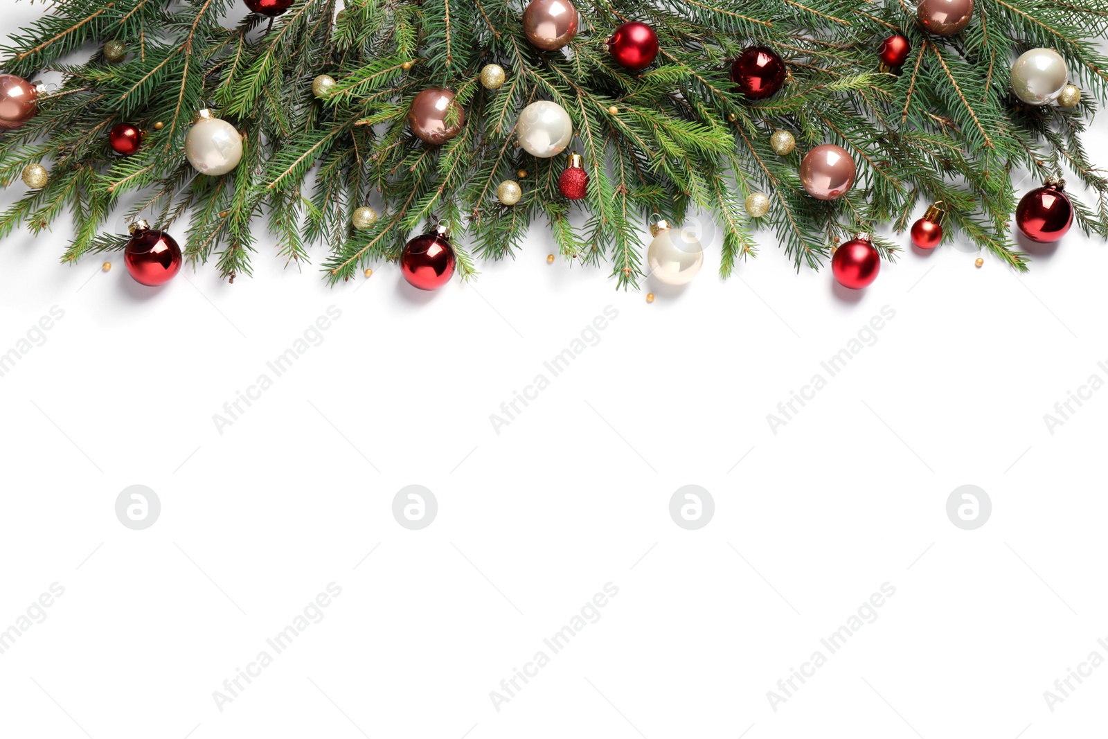 Photo of Fir branches with Christmas decorations on white background, flat lay