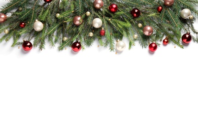 Fir branches with Christmas decorations on white background, flat lay