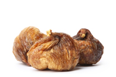 Photo of Delicious dried fig fruits on white background. Organic snack