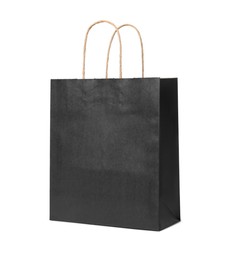 Photo of Black gift paper bag on white background