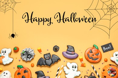 Image of Happy Halloween. Flat lay composition with decorated gingerbread cookies on yellow background