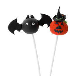 Photo of Delicious Halloween themed cake pops on white background