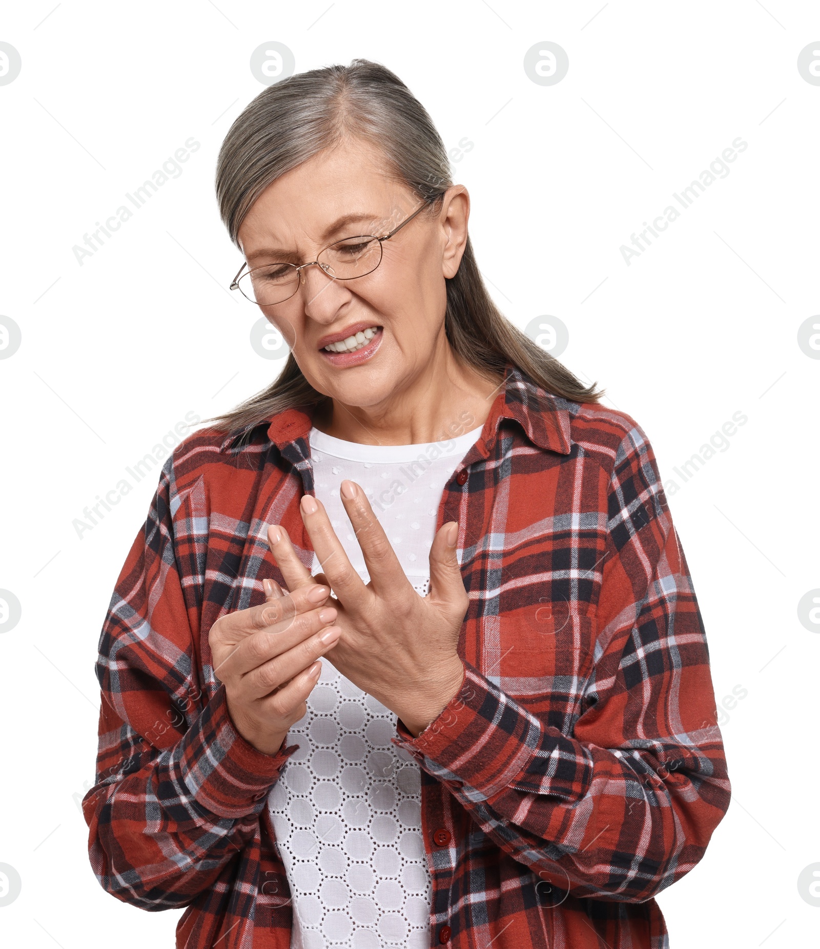 Photo of Arthritis symptoms. Woman suffering from pain in fingers on white background