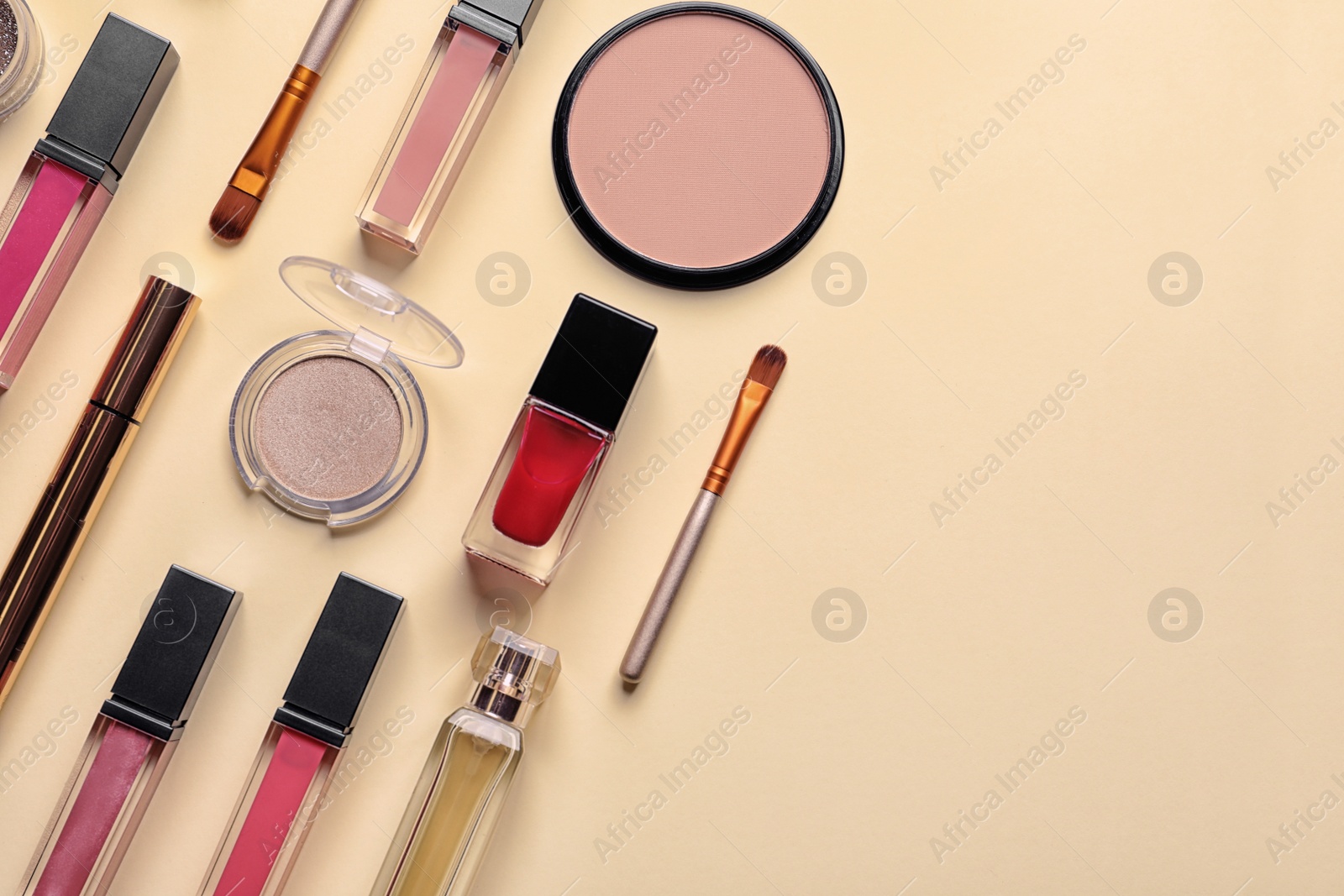 Photo of Beautiful composition with lipsticks on color background, flat lay. Space for text