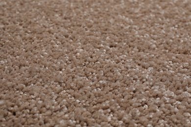 Fuzzy carpet texture as background, closeup view