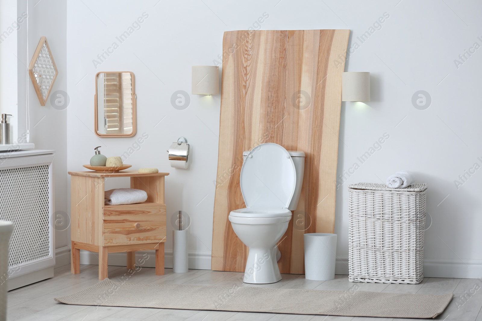 Photo of Toilet bowl in modern bathroom interior