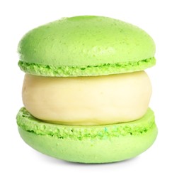 Photo of Green macaron on white background. Delicious dessert