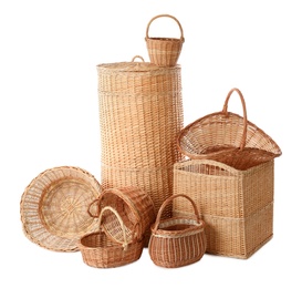Photo of Many different wicker baskets on white background