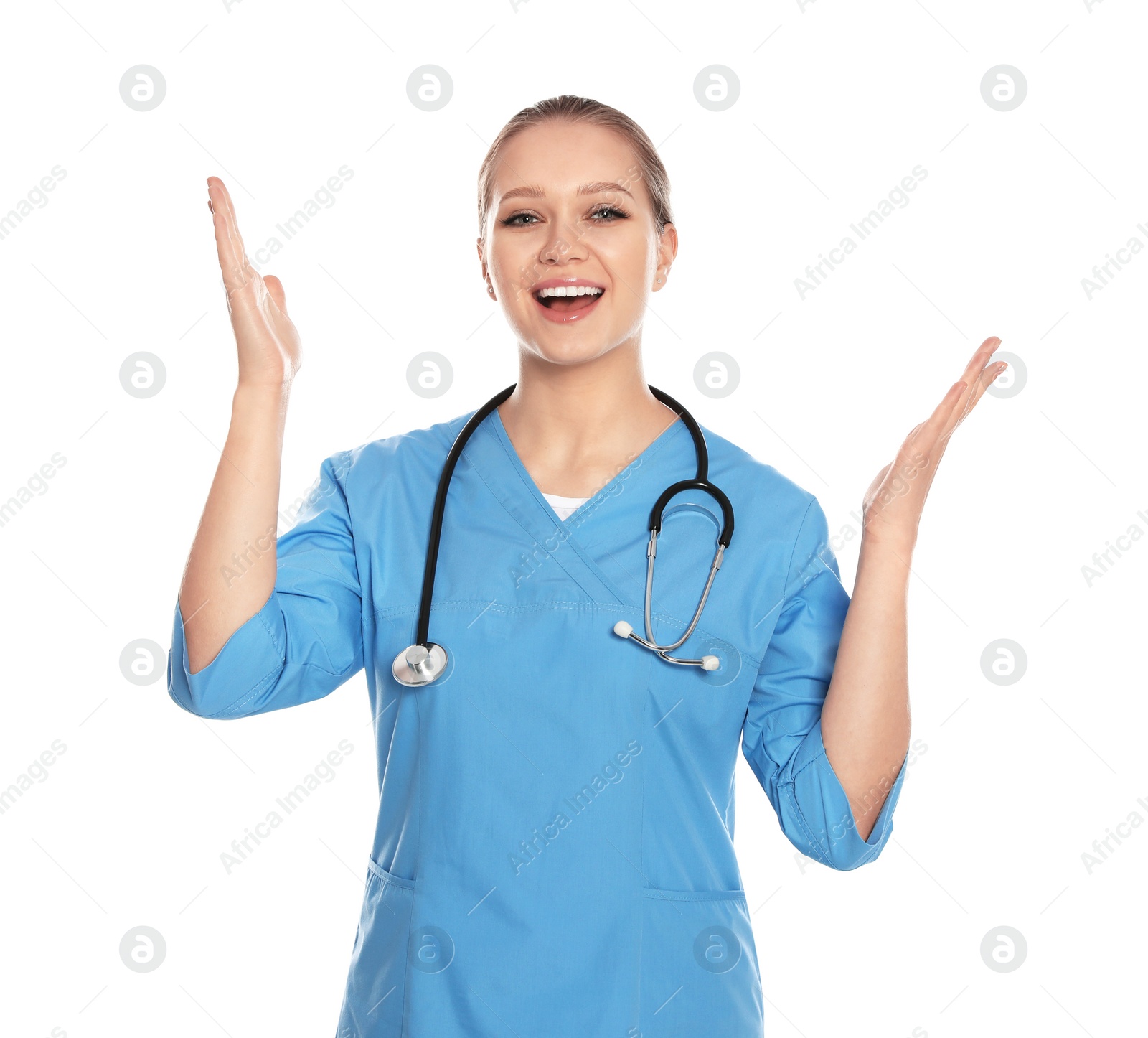 Photo of Portrait of emotional medical doctor with stethoscope isolated on white