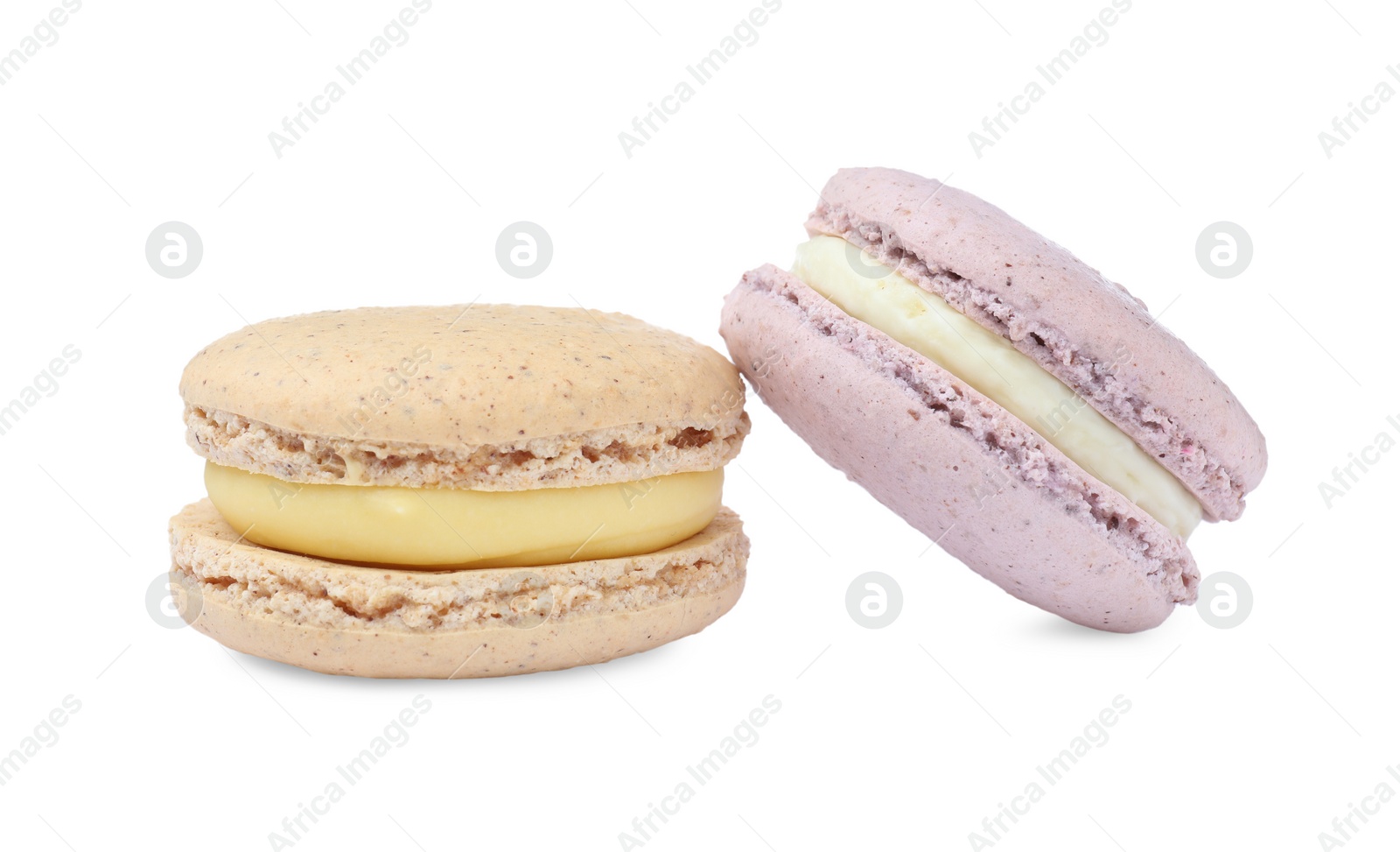 Photo of Different delicious colorful macarons on white background