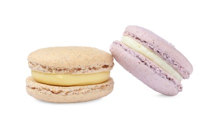 Photo of Different delicious colorful macarons on white background