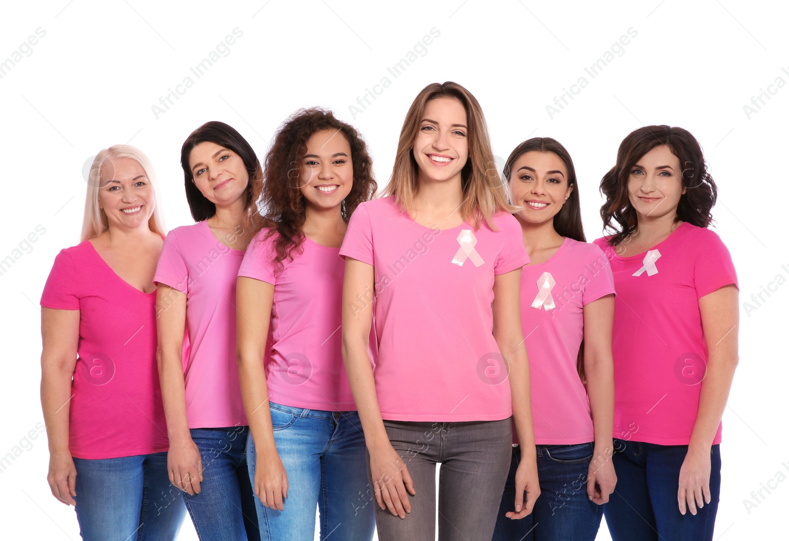 Photo of Group of women with silk ribbons on white background. Breast cancer awareness concept