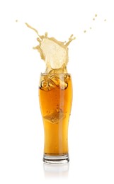 Photo of Beer splashing out of glass on white background