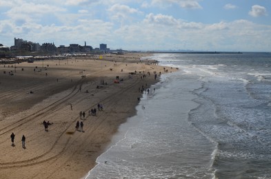 Photo of HAGUE, NETHERLANDS - SEPTEMBER 10, 2022: Beautiful view of Scheveningen beach on sunny day