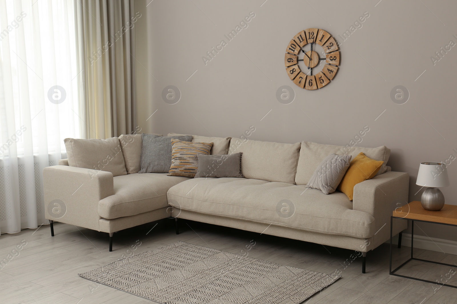 Photo of Stylish living room interior with modern comfortable sofa