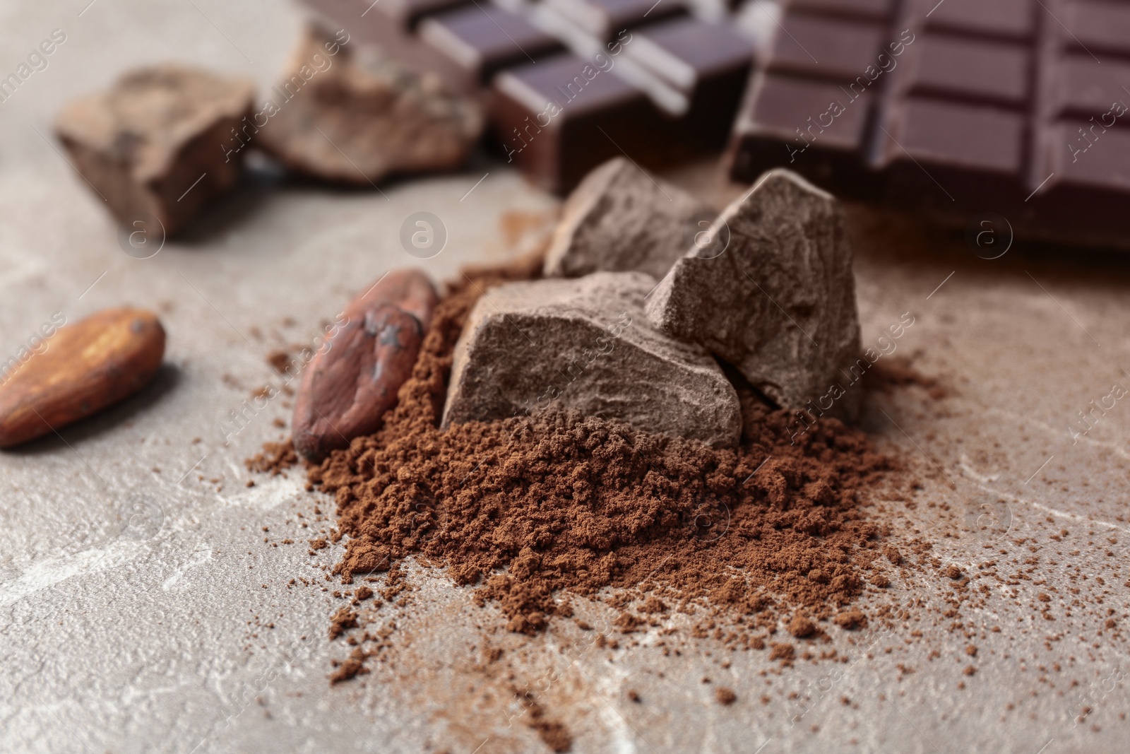 Photo of Composition with cocoa products on table