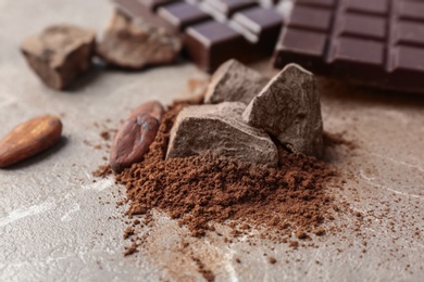 Photo of Composition with cocoa products on table