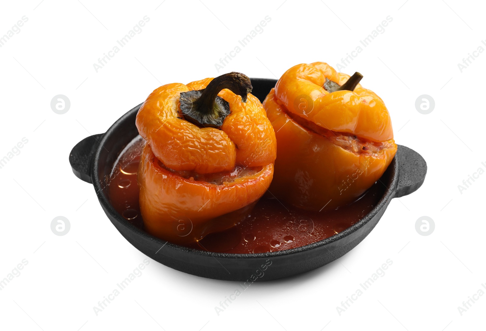 Photo of Tasty stuffed peppers in pan isolated on white