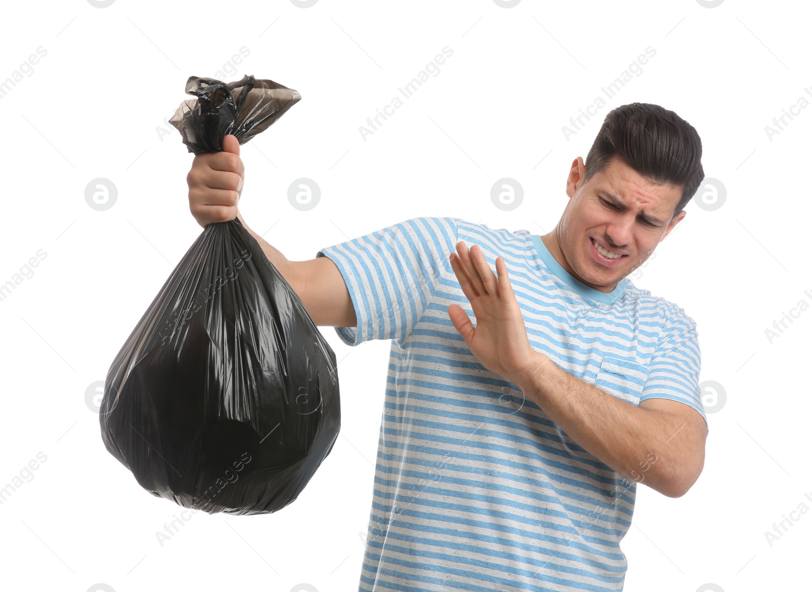 Photo of Man holding full garbage bag on white background