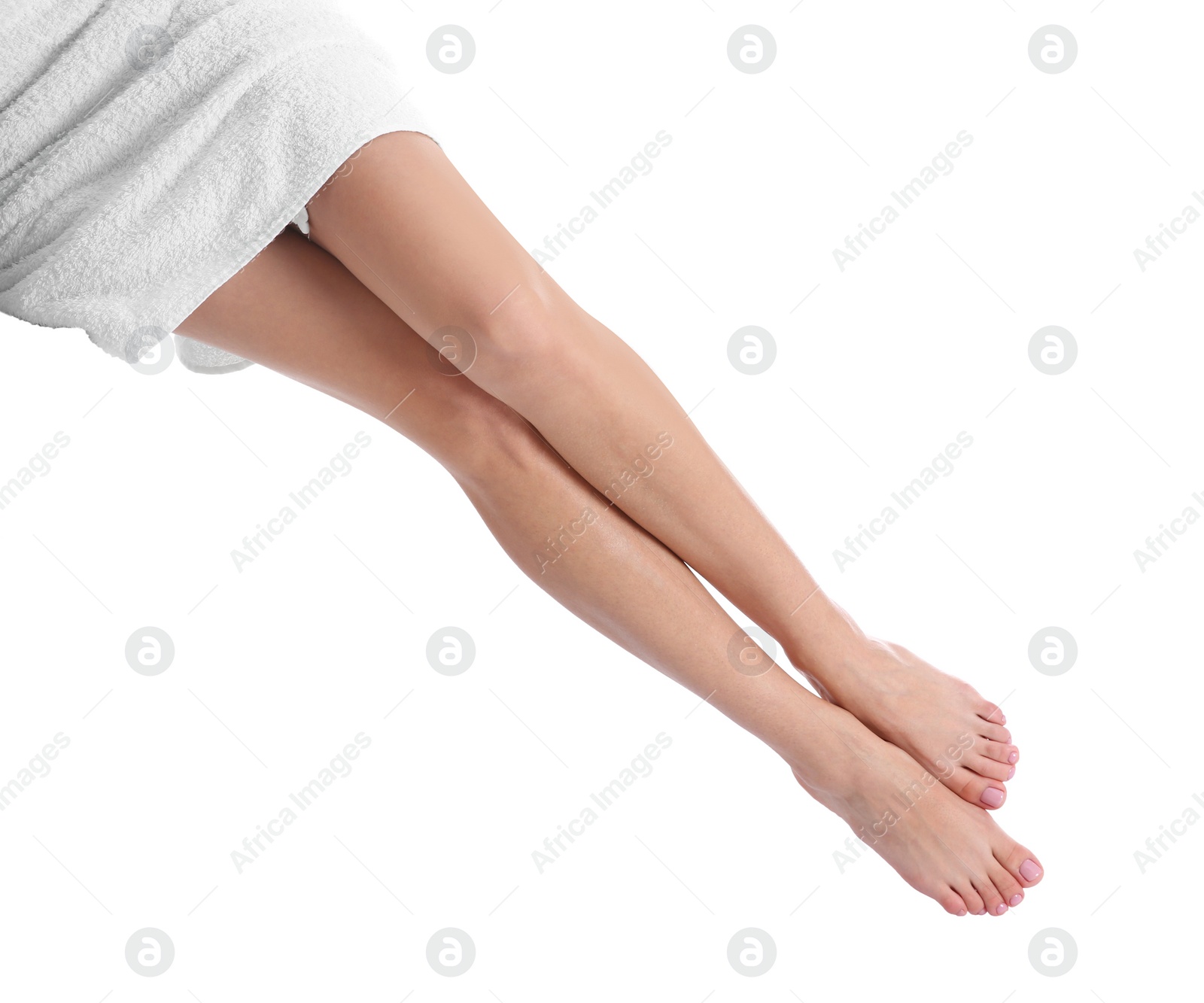 Photo of Woman with beautiful legs and feet on white background, closeup. Spa treatment