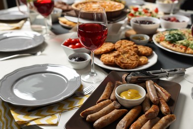 Photo of Brunch table setting with different delicious food and drink