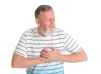 Photo of Mature man having heart attack on white background