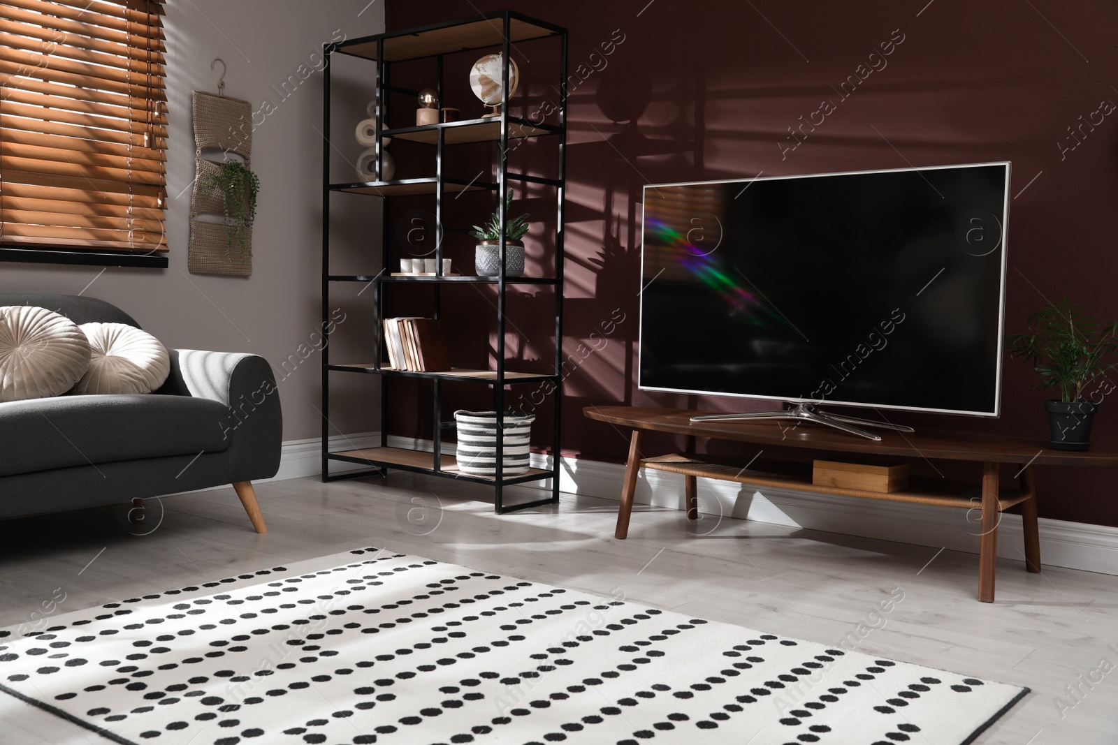 Photo of Living room interior with modern TV on stand