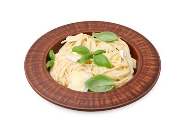 Delicious pasta with brie cheese and basil leaves isolated on white