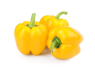 Ripe yellow bell peppers isolated on white