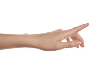 Photo of Woman pointing at something on white background, closeup