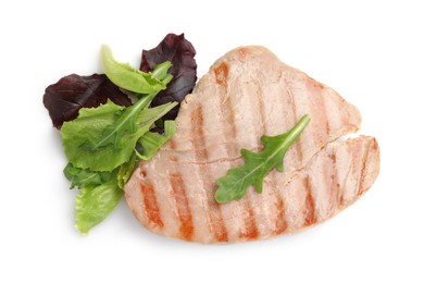 Delicious tuna steak with salad isolated on white, top view