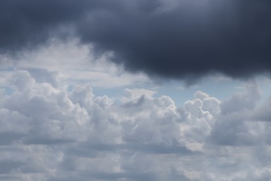 Sky with heavy rainy clouds on grey day